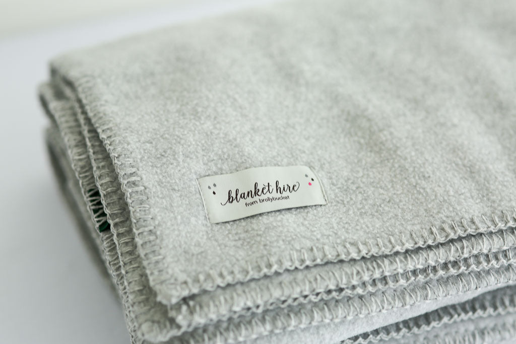 Crate of Fleece Blankets to Hire for Weddings and Parties Throw